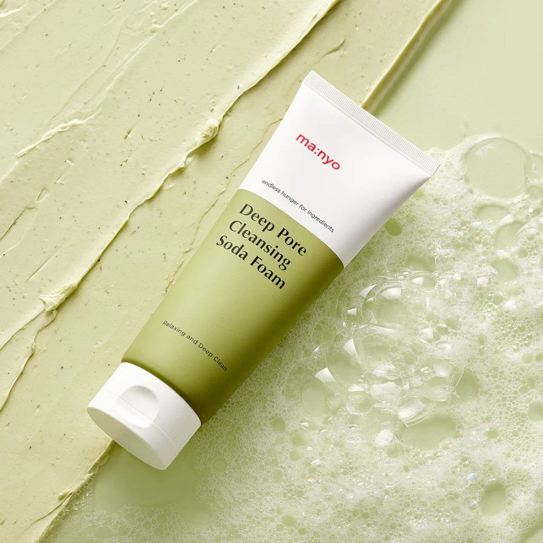ma:nyo Purifying Cleansing Soda Foam 150ml in a green tube with bubbles, ideal for deep cleansing and refreshing skin.