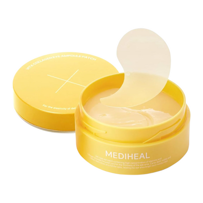 MEDIHEAL eye patch cream in a round yellow jar with the lid placed beside it, showing a translucent adhesive eye patch resting on the cream inside.