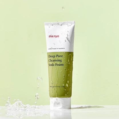 ma:nyo Purifying Cleansing Soda Foam 150ml in a white and green tube, with water splashes.