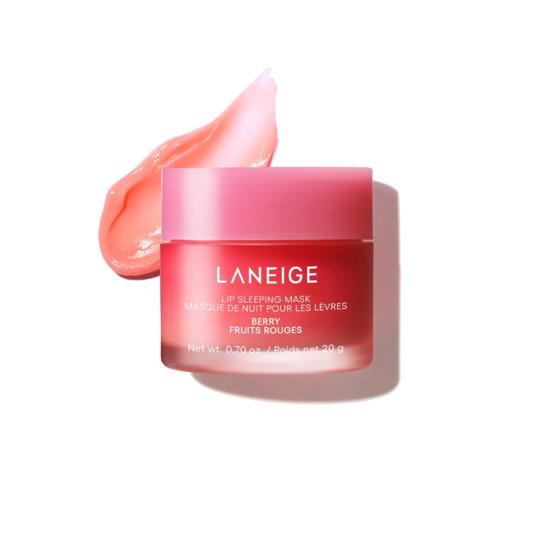 LANEIGE Lip Sleeping Mask in Berry Fruits Rouges, shown in a translucent pink jar with a matching lid, accompanied by a swipe of the pink berry-colored cream on a clean white background.