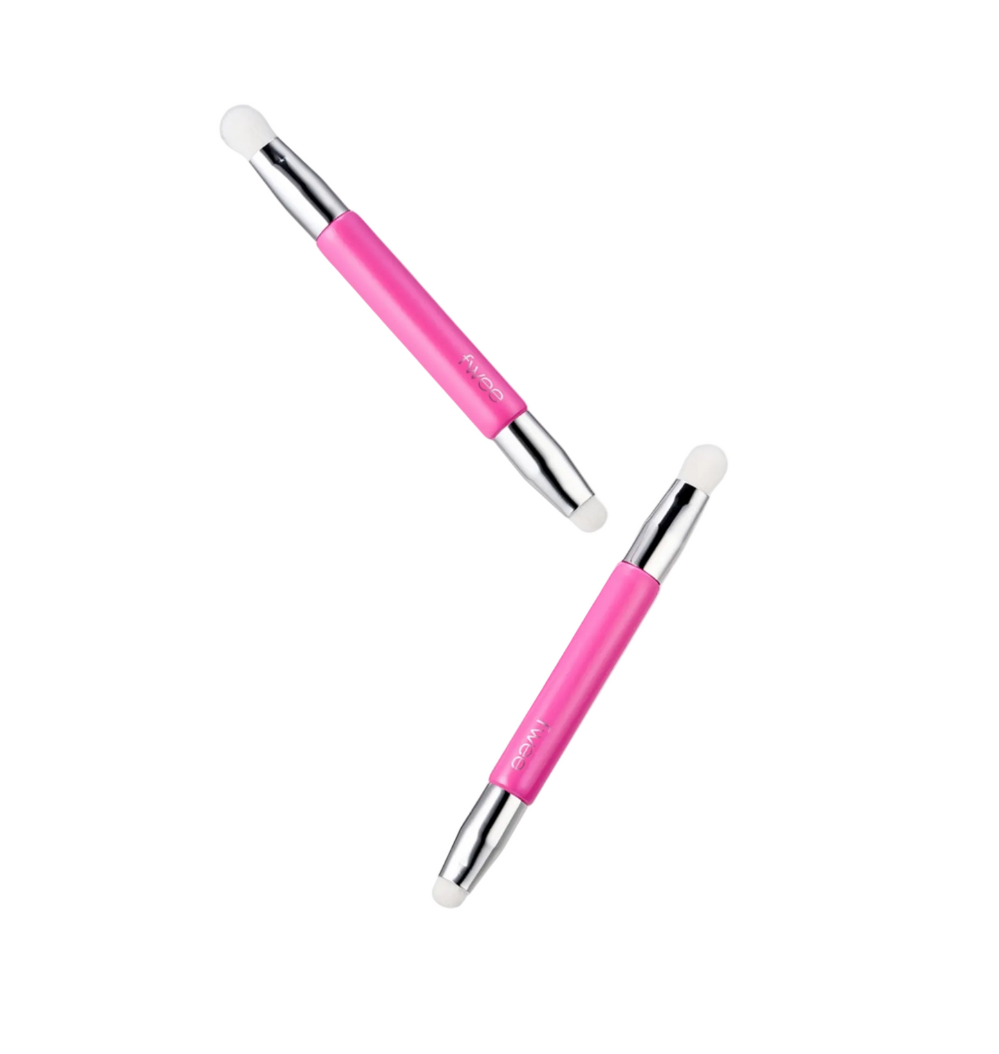 Two pink and silver dual-ended facial cleansing brushes floating diagonally on a light gray background.