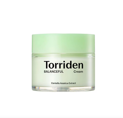 A jar of Torriden Balanceful Cream with a light green lid and clear glass container showing the off-white cream inside, set against a plain white background.