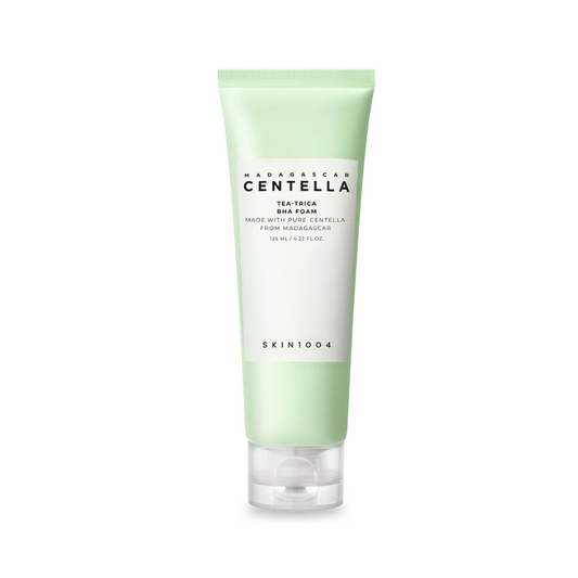A tube of SKIN1004 Arabian Centella Tea Tree Sun Foam moisturizer, featuring a pale mint green and white design with a clear cap, set against a plain white background.