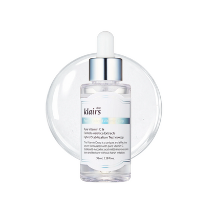 A clear glass dropper bottle of klairs Vitamin C + B5 Cellulose Enrichment Serum with a silver cap and white dropper, set against a white background with a subtle circular reflection.