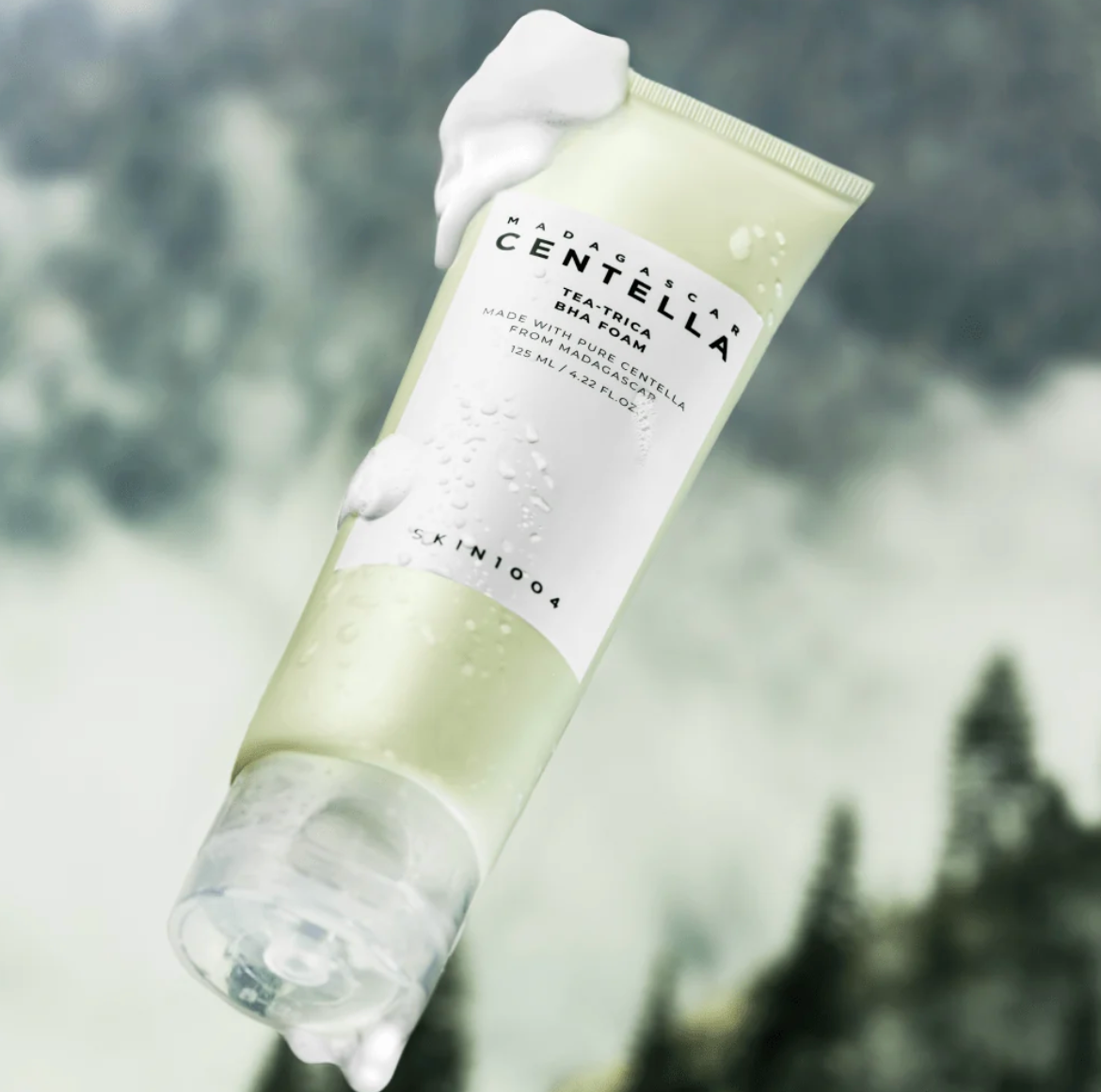 Tube of Madara Centella Tea Tree Skin Foam with a blurred natural background