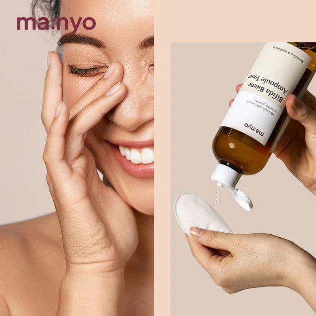 ma:nyo Bifida Biome Ampoule Toner 400ml being applied to a cotton pad by a woman smiling, showcasing its hydration benefits.