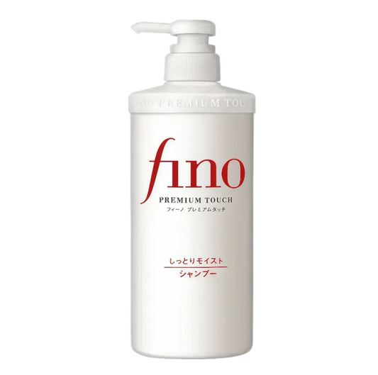 A white pump bottle of fino Premium Touch shampoo with red and black text, centered on a light gray background.
