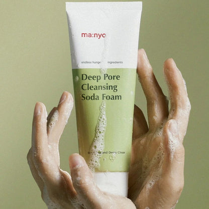 ma:nyo Purifying Cleansing Soda Foam 150ml in hands, showcasing fresh, deep-cleaning formula.